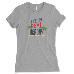 Product mockup of the funny, travel-inspired Feelin' Real Beachy print by Relateeble on an athletic colored women's short sleeve tee