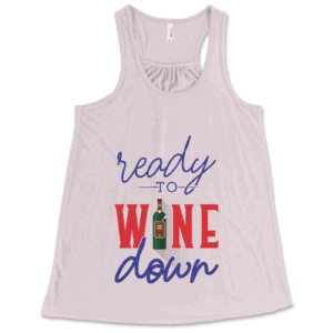 Product mockup of the relatable, drinking-inspired Ready to Wine Down print by Relateeble on a soft pink colored women's flowy racerback tank top